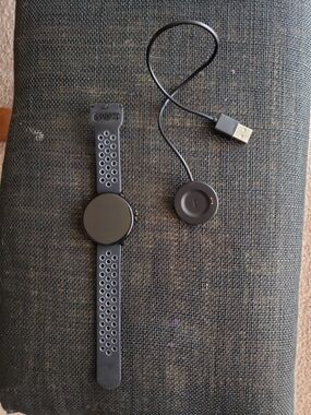 Black Round Smartwatch with USB Magnetic Charger and Sport Strap